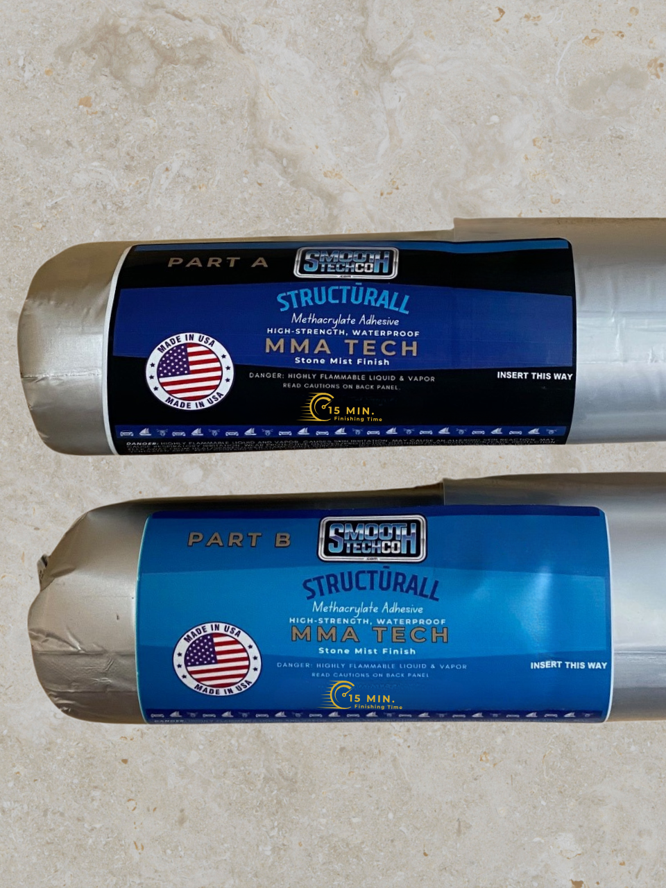 Two rolls of Structurlall MMA Five Adhesive (sausages) on a beige background