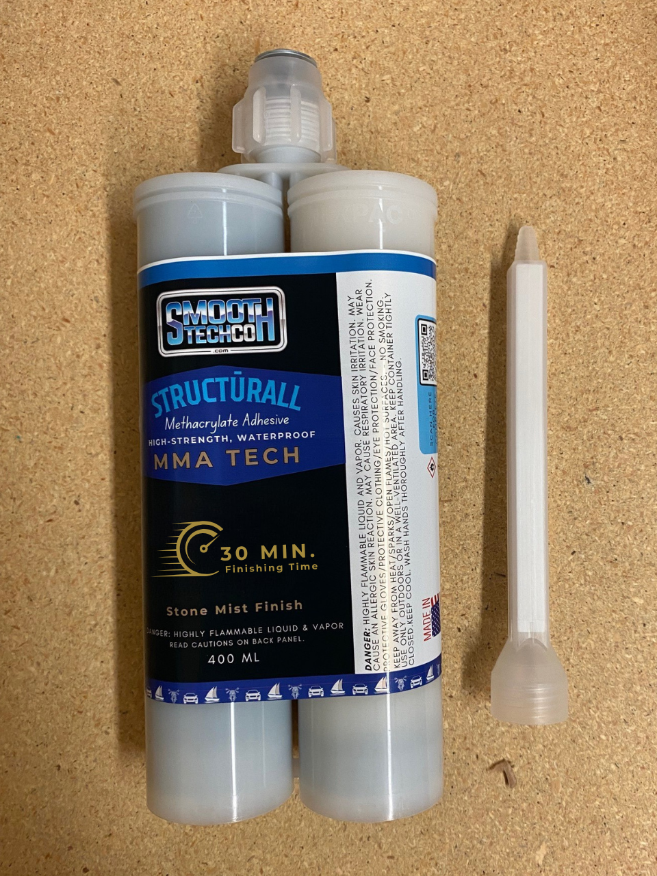 MMA Ten structural adhesive, 400 ml, & static mixer on a cork background.